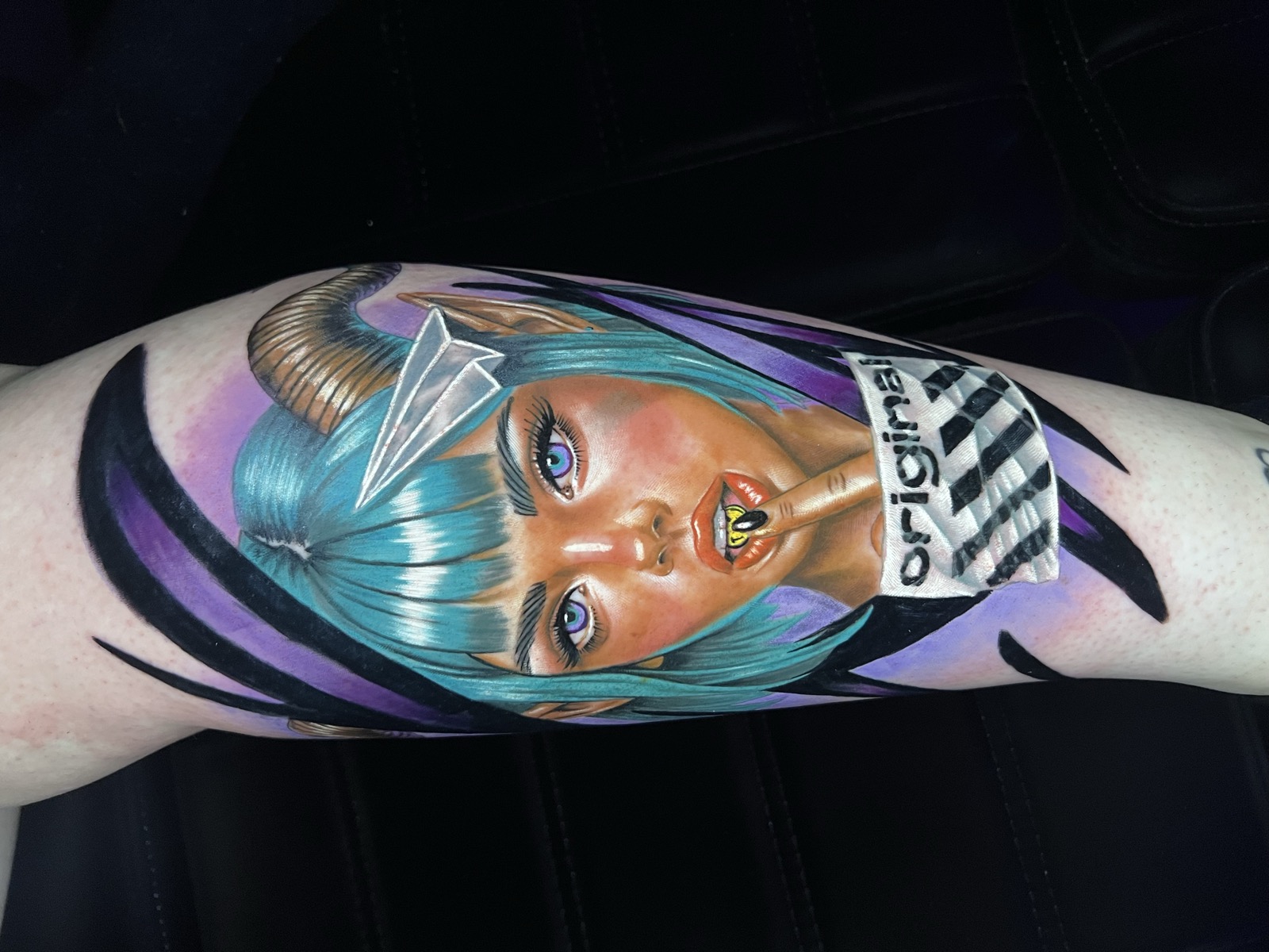 Realistic anime tattoo